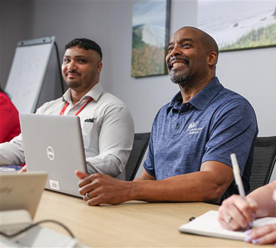 AAA Life Associates In a Meeting